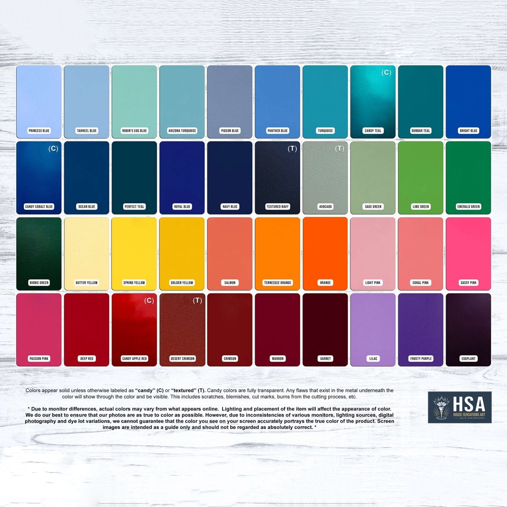 Color swatch chart displaying various shades of blue, green, red, and other colors on white wooden background, showcasing custom metal sign finishes and decorative paint options