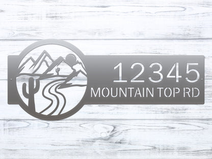 Desert Mountain Monogram Address Plaque featuring laser-cut metal design with mountains and river, showcasing personalized house numbers. Ideal for outdoor décor and housewarming gifts, reflecting elegance and charm.