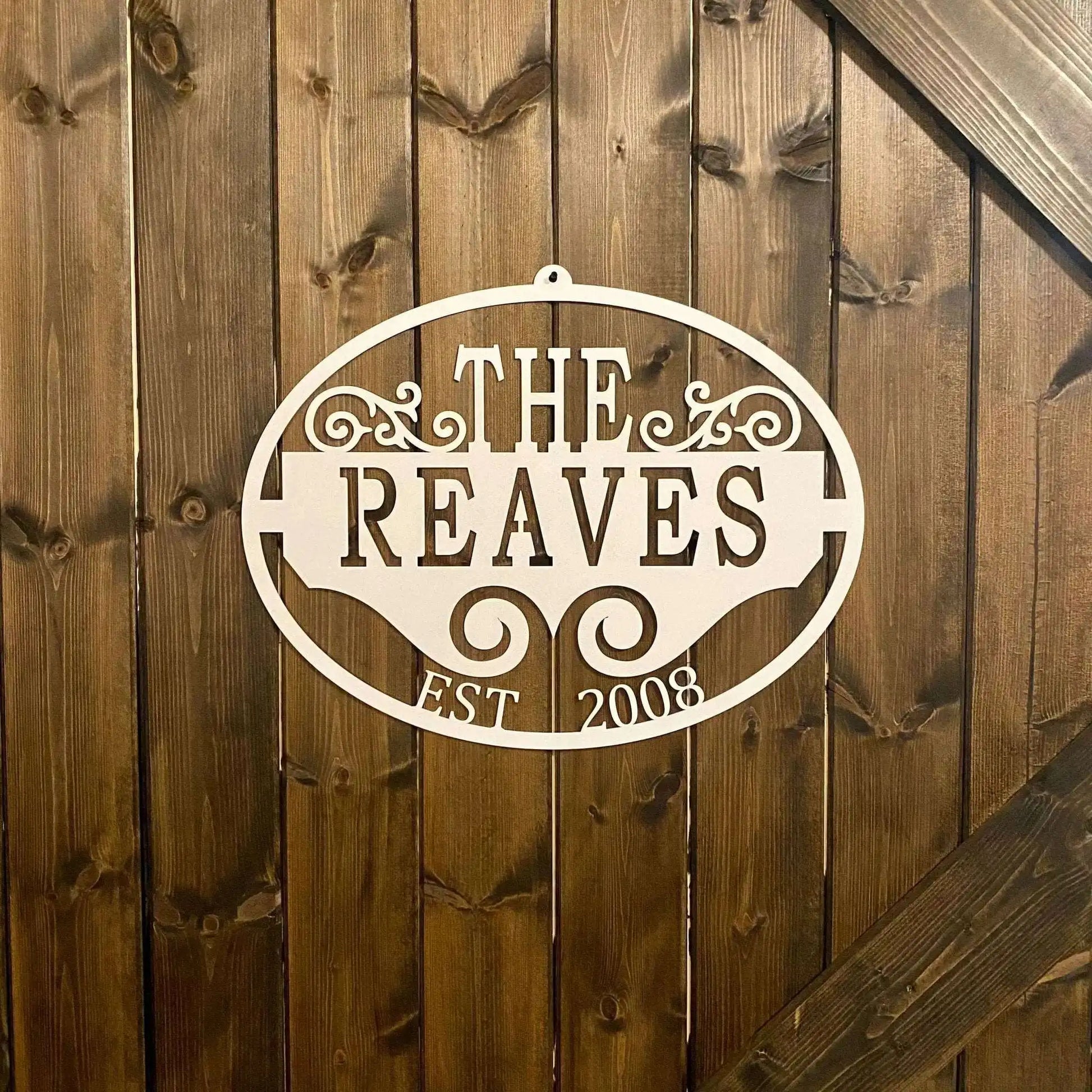 Elegant Family Name & Established Date Sign on a wooden surface, showcasing precise laser-cut craftsmanship, ideal for personalized home decor or outdoor display from House Sensation Art.