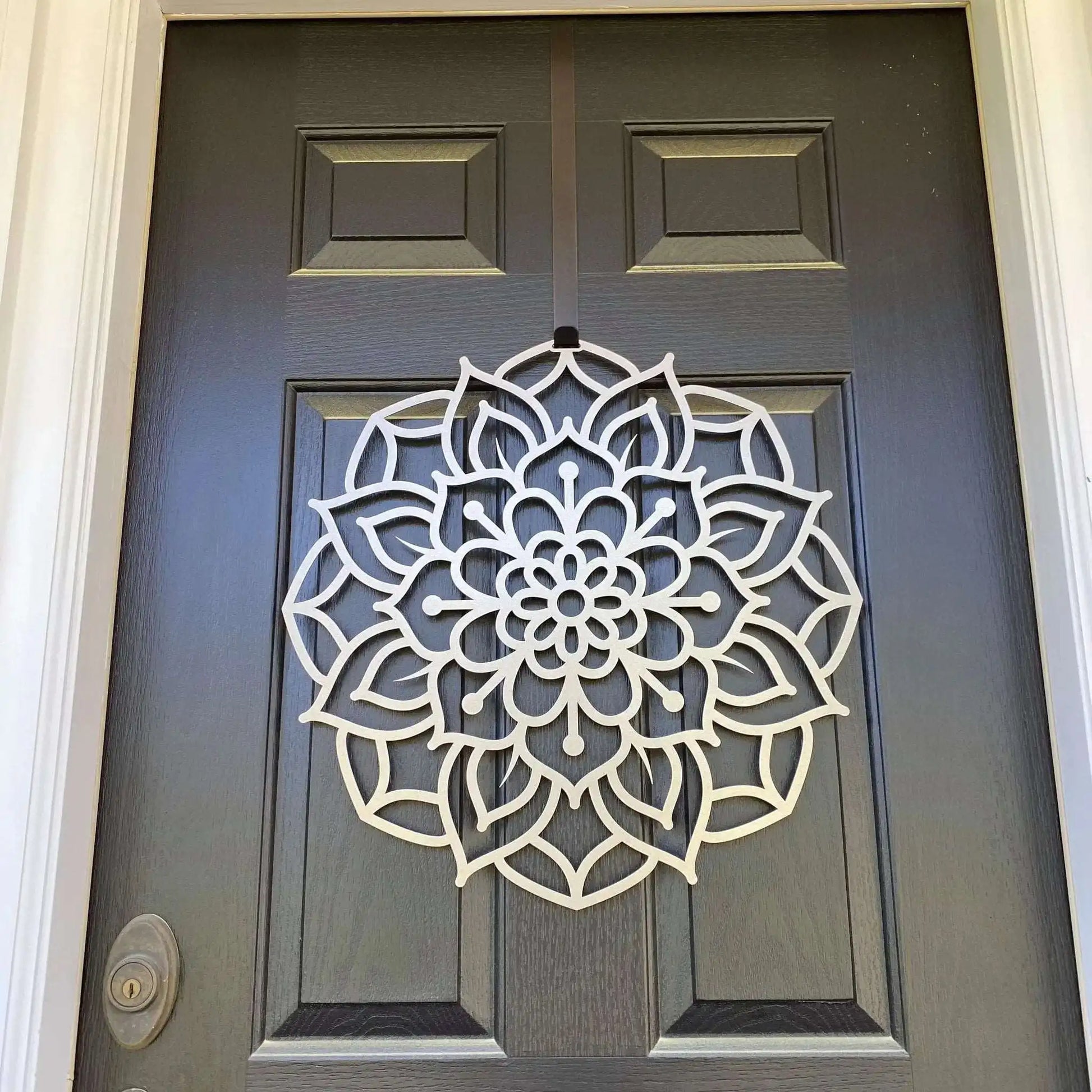 Lotus Mandala Front Door Wreath - Customizable Metal Door Decor; features an intricate mandala design on a door, highlighting its craftsmanship and versatility as a unique seasonal gift.