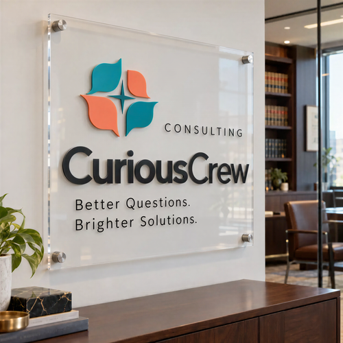 a sign for a company called "Curious Crew" that provides consulting services. The sign displays the company's logo and the slogan "Better Questions. Brighter Solutions." The sign is mounted on a wall in an office setting, with a desk and a plant visible in the background.