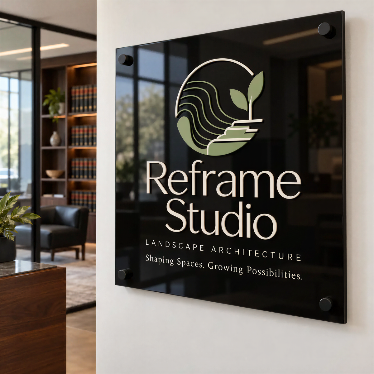 a sign for a company called "Reframe Studio" that specializes in landscape architecture.