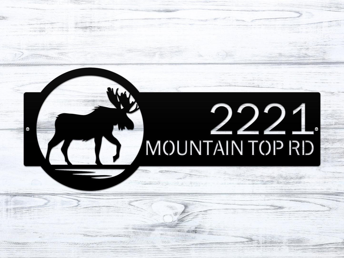 Moose Cabin Address Sign featuring a black moose silhouette with customizable house numbers and text, perfect for enhancing home décor and curb appeal. Durable and weather-resistant, ideal for outdoor use.