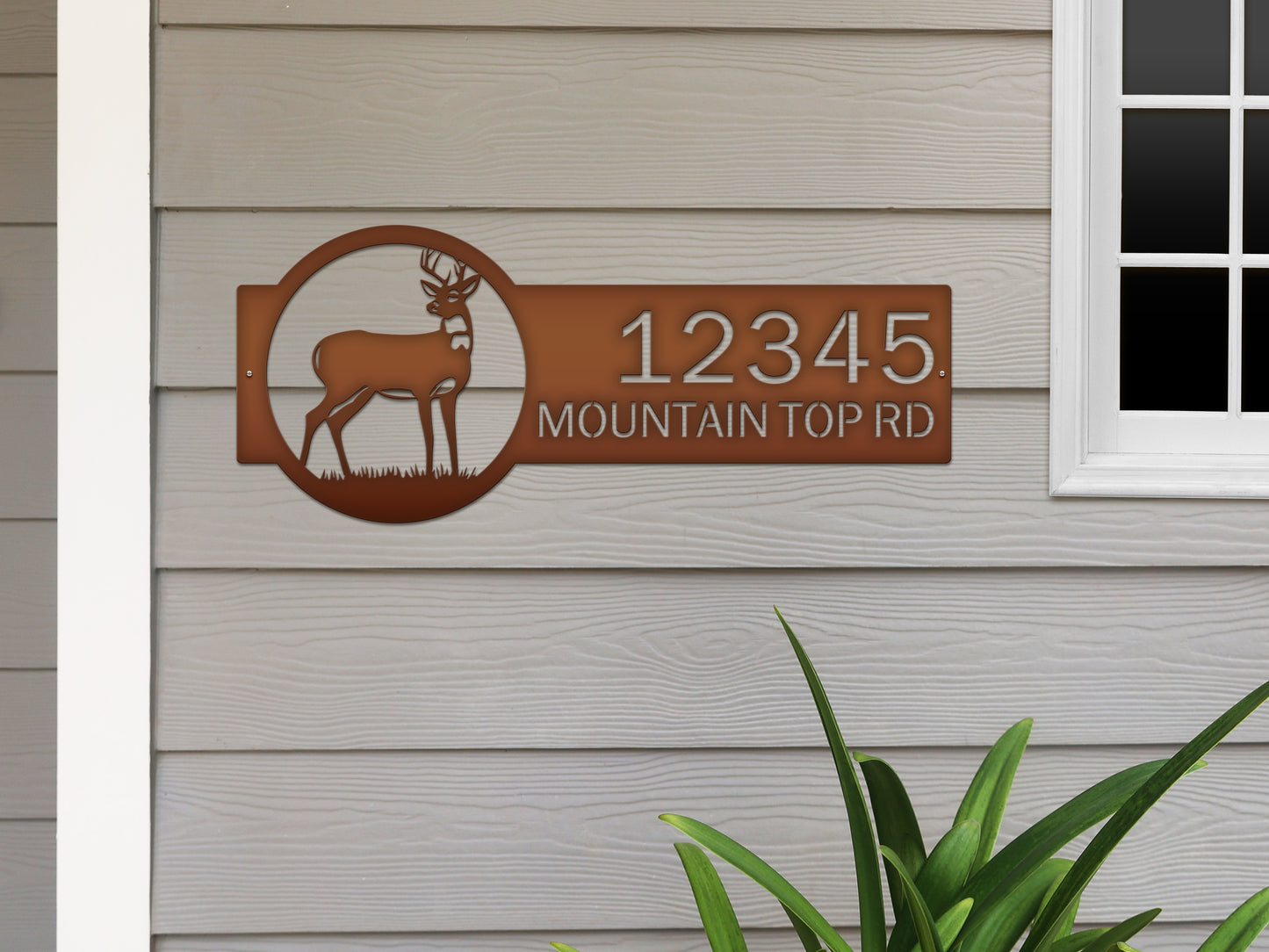 Customizable Deer Home Address Sign featuring metal deer art and large house numbers, ideal for outdoor décor and housewarming gifts. Durable, weather-resistant steel design with personalization options for unique home accents.