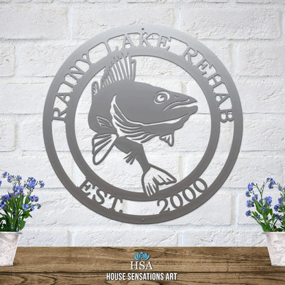 Personalized Walleye Fishing Sign - Custom Metal House Number Plaque featuring a metal fish design on a white brick wall, ideal for outdoor decor in gardens, yards, or farms.