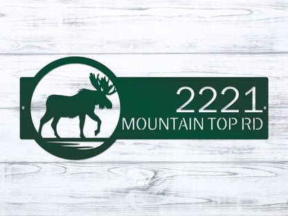 Moose Cabin Address Sign featuring a green moose with antlers, surrounded by custom house numbers and street name, crafted from precision-cut steel for weather-resistant outdoor home décor.