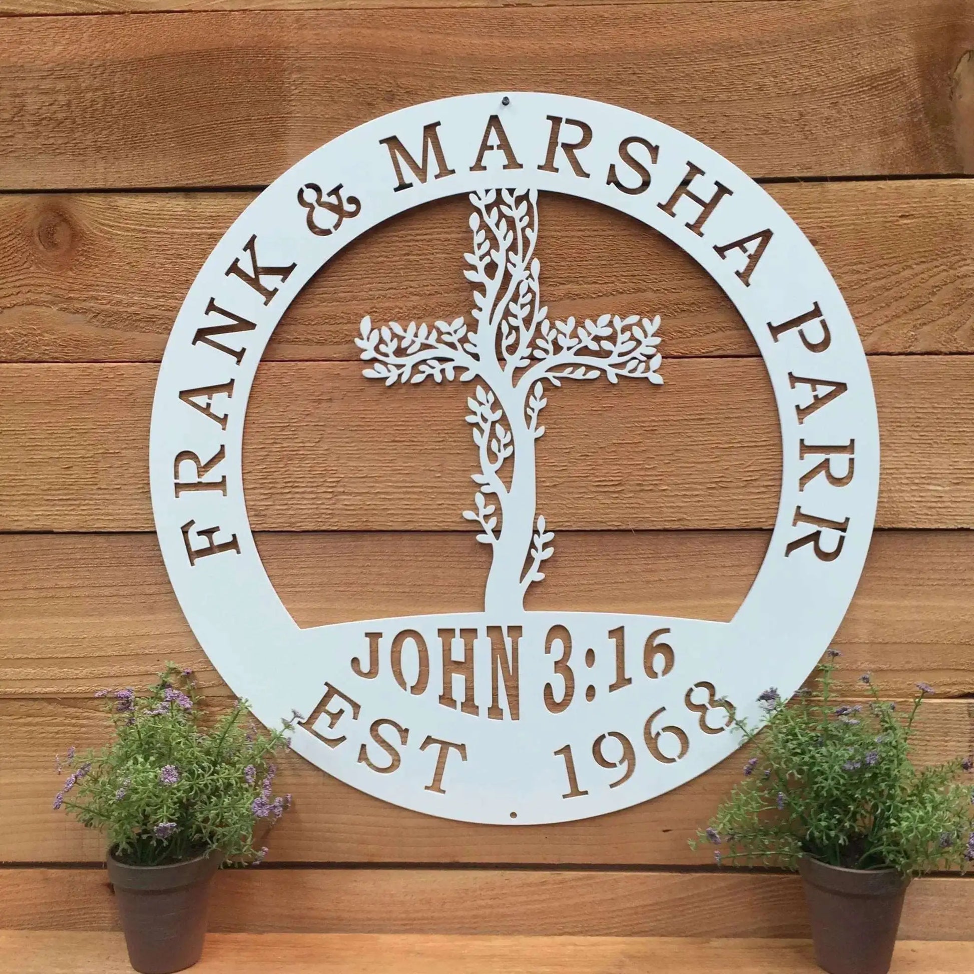 Living Tree Cross with John 3:16 Scripture, a custom metal wall art sign featuring a white cross with leaves, potted plants, and customizable text options for personalized home or garden decor.