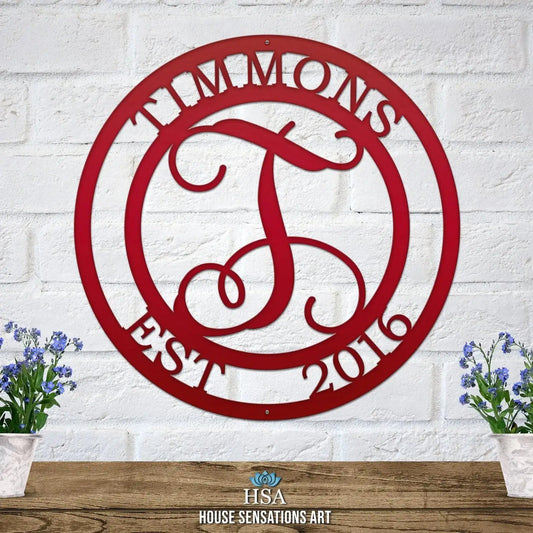 Vine Monogram Name Date Sign - Personalized Family Name Sign crafted from durable steel, showcasing a laser-cut design on a white brick wall, perfect for home decor or as a wedding gift.