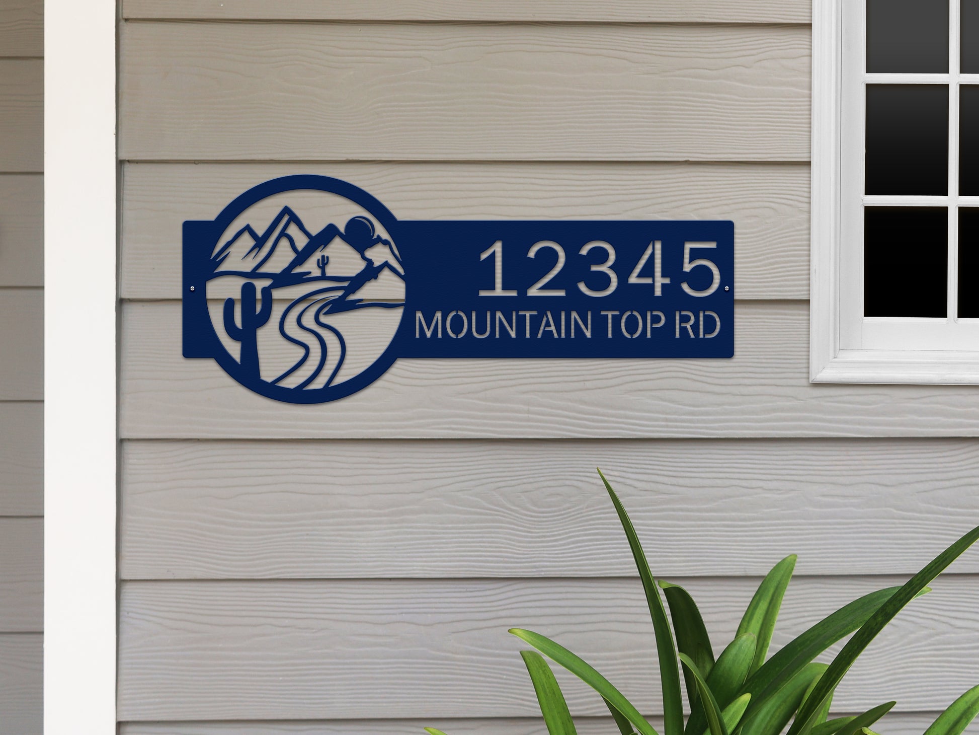 Desert Mountain Monogram Address Plaque displayed on a wall, featuring custom metal house numbers and personalized family name, highlighting its elegant design as a weather-resistant outdoor sign for home décor.