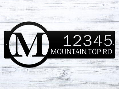 Metal Monogram Address Sign featuring a personalized monogram and house numbers, expertly laser-cut from steel, showcasing elegant custom design for home décor and gifting by HouseSensationsArt.