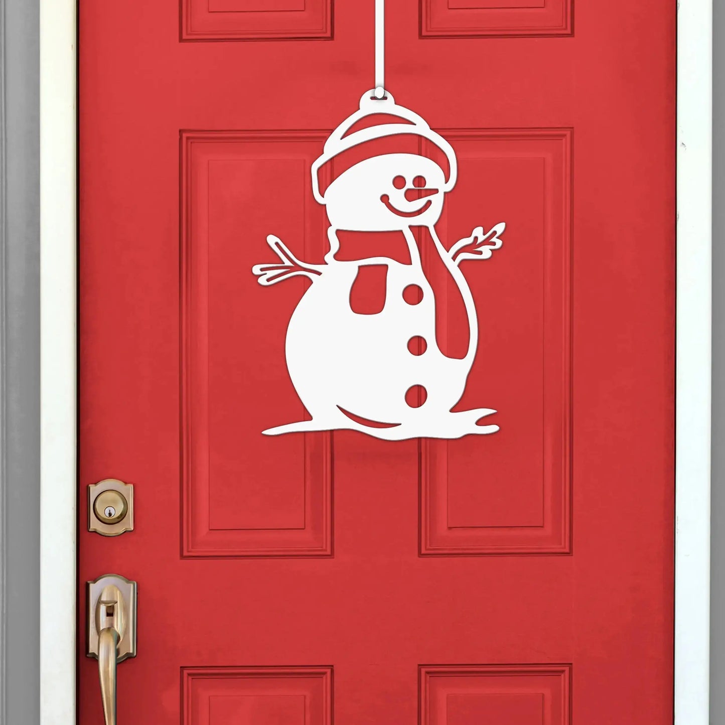 Snowman Door Hanger and Wall Art adorning a red door, showcasing a festive snowman design perfect for winter decor.