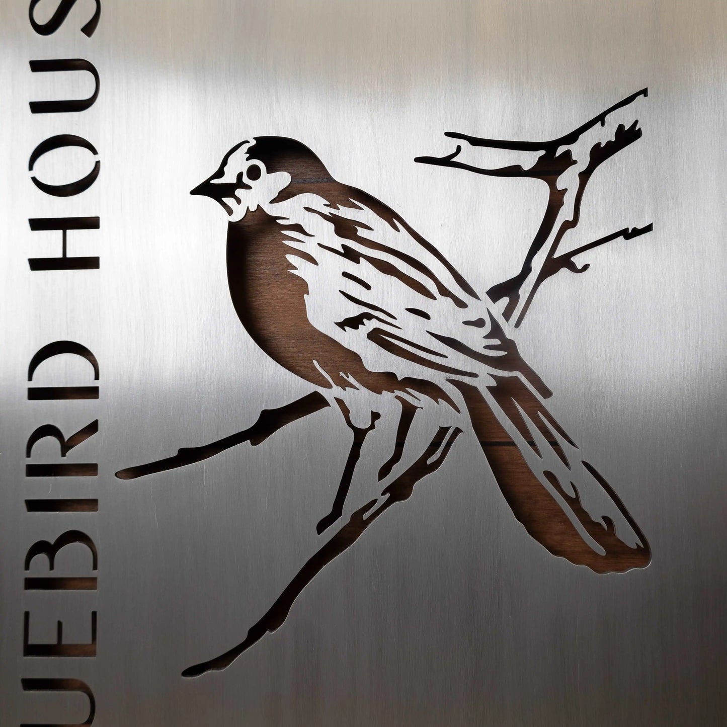 Hand Brushed Aluminum Business Logo Sign showcasing a bird on a branch, intricately cut from durable aluminum, perfect for personalized indoor/outdoor displays like storefronts or office walls.