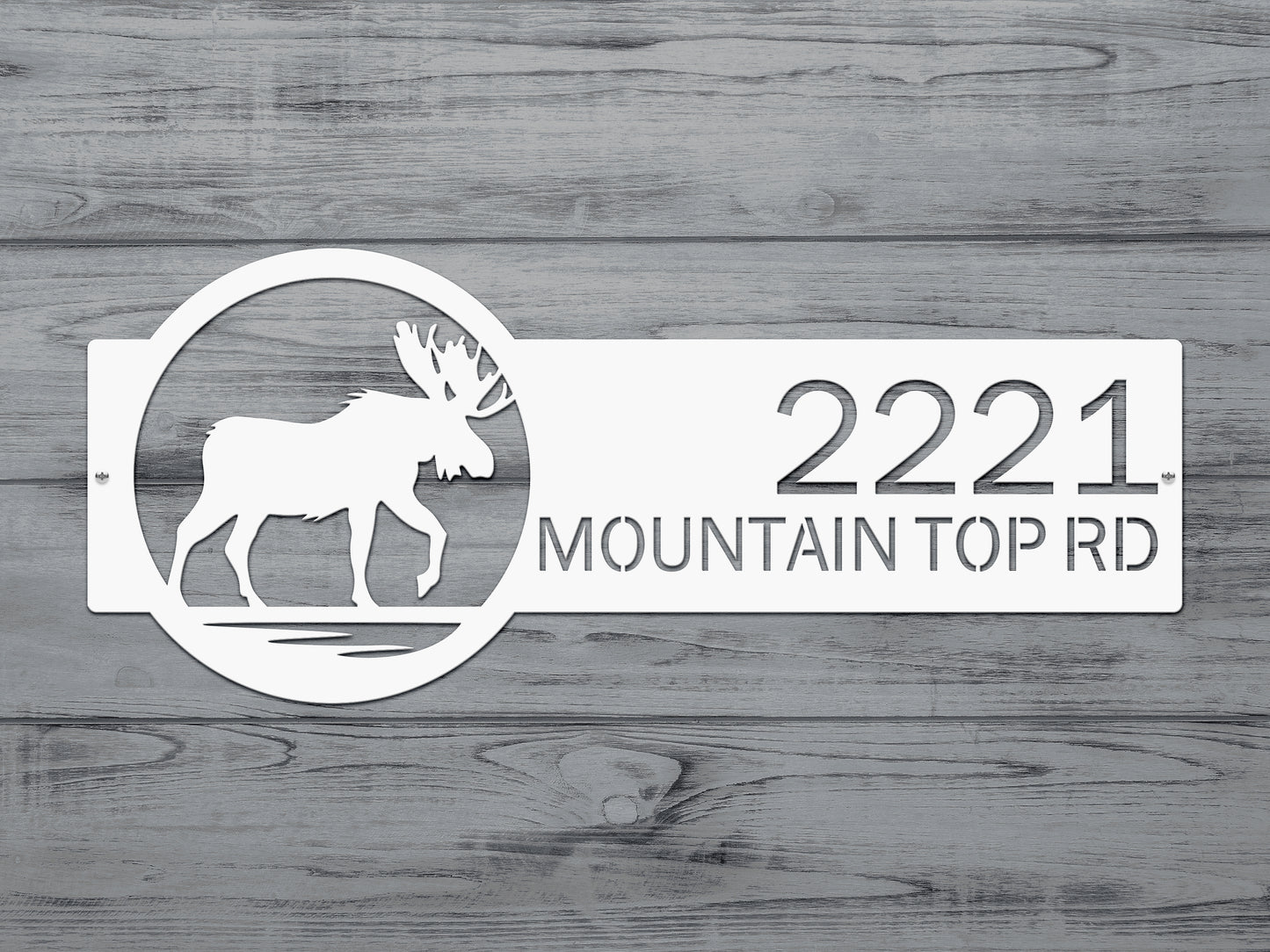 Moose Cabin Address Sign featuring a laser-cut white moose silhouette with customizable house numbers, expertly crafted from durable steel for outdoor use, enhancing home décor and curb appeal.