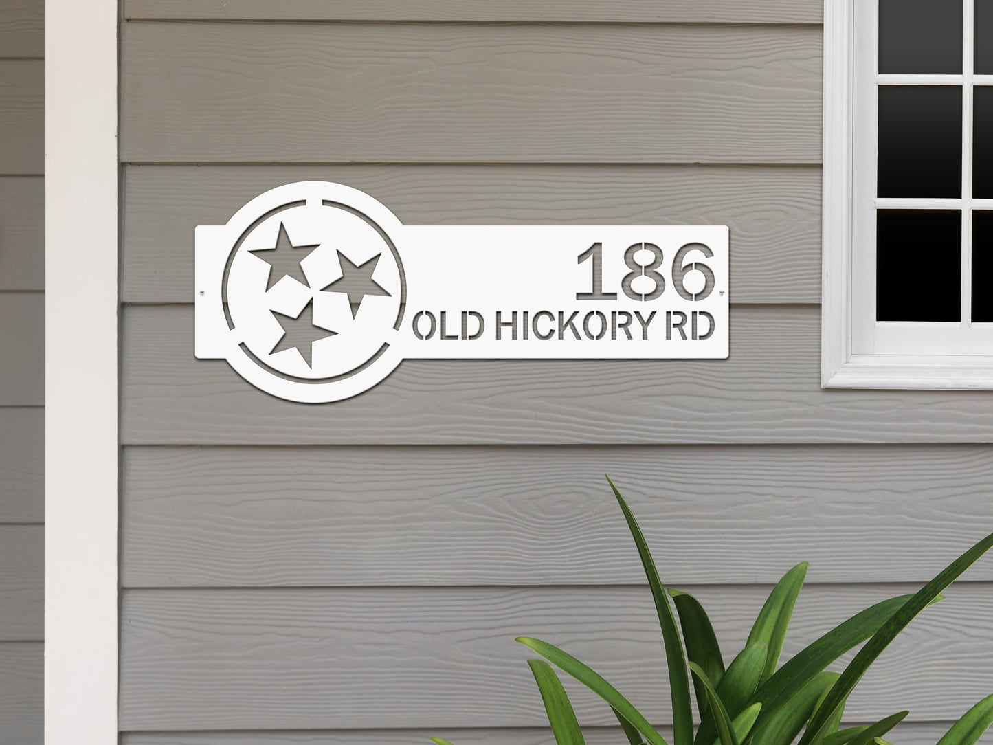 Tennessee Tristar Address Sign Plaque featuring custom house numbers and street name, precision laser-cut from heavy-duty steel, showcased against a wall. Ideal for home décor and as a housewarming gift.