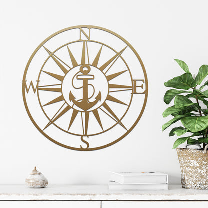 Personalized GPS & Location Anchor Compass Sign displayed on a white surface with a decorative plant, showcasing a beautifully designed compass and anchor, ideal for nautical-themed decor or functional navigation use.