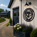Black Border Collie farm metal sign mounted on farmhouse exterior wall with barn doors and flower planter below