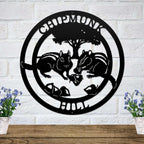 Black chipmunk hollow metal wall decor with woodland animal scene and tree silhouette mounted on white brick wall farmhouse style art