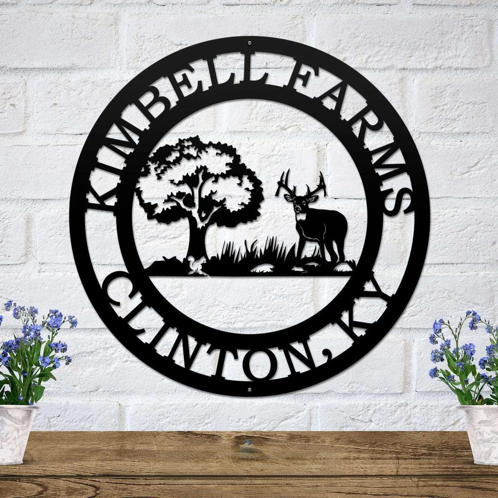 Black personalized deer scene metal wall art featuring buck deer tree landscape and custom cabin name