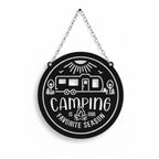 Camping Is Our Favorite Season metal sign displayed front-facing with detailed camper trailer artwork, campfire design, and hanging chain on a clean background.