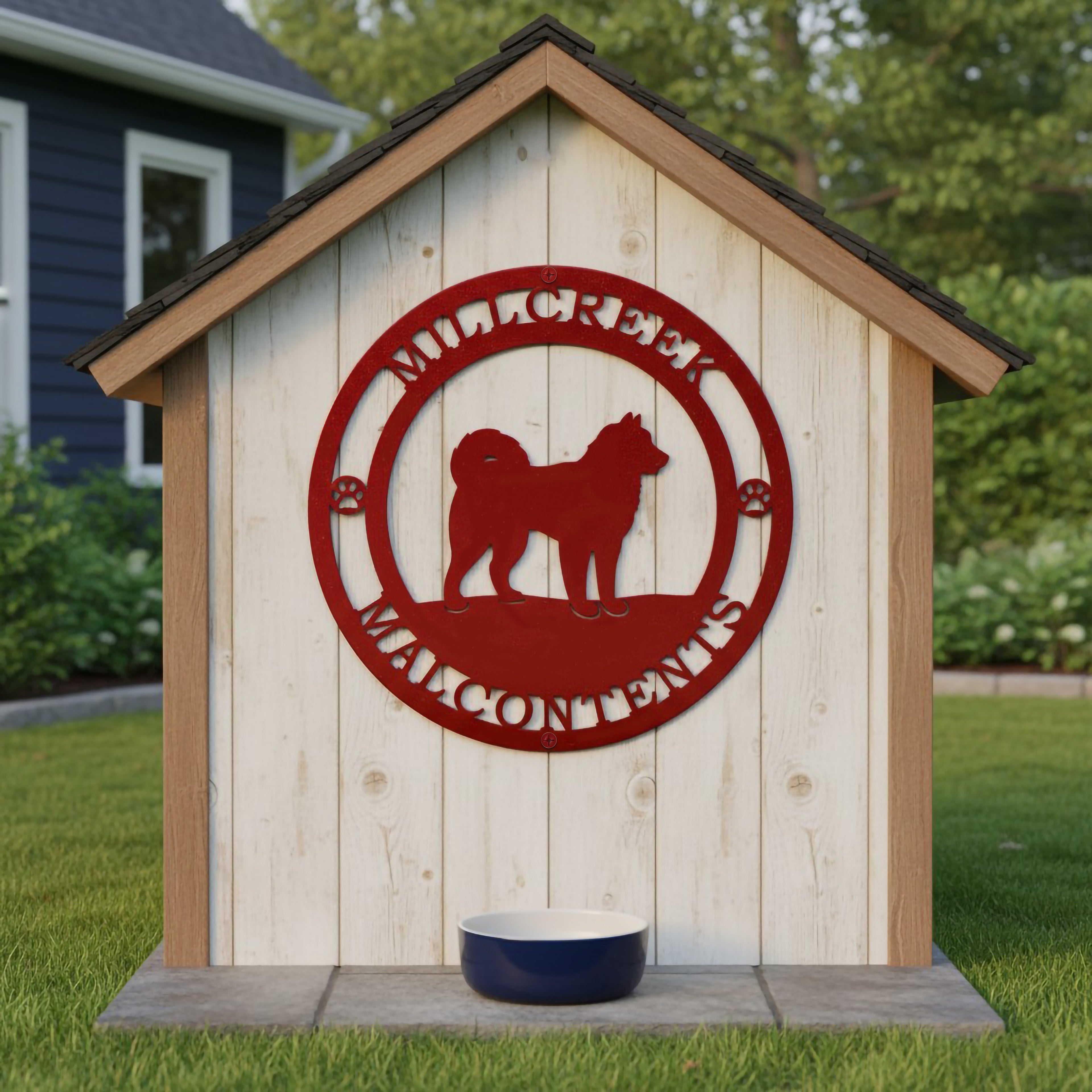 Red Mill Creek Malcontents dog metal sign mounted on a white dog house with pet bowl and backyard setting