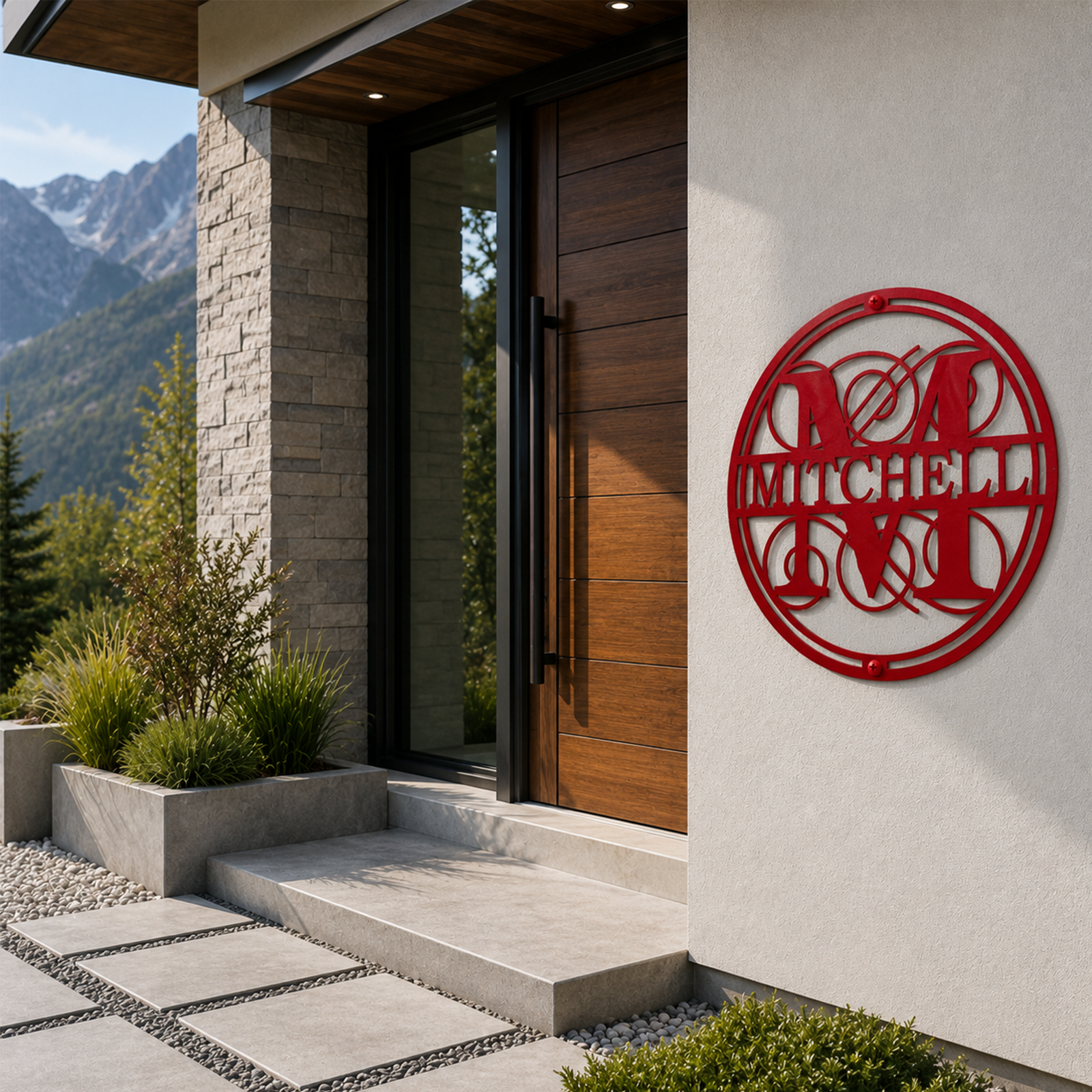 Red custom monogram metal wall sign with Mitchell family name mounted beside a contemporary outdoor front door