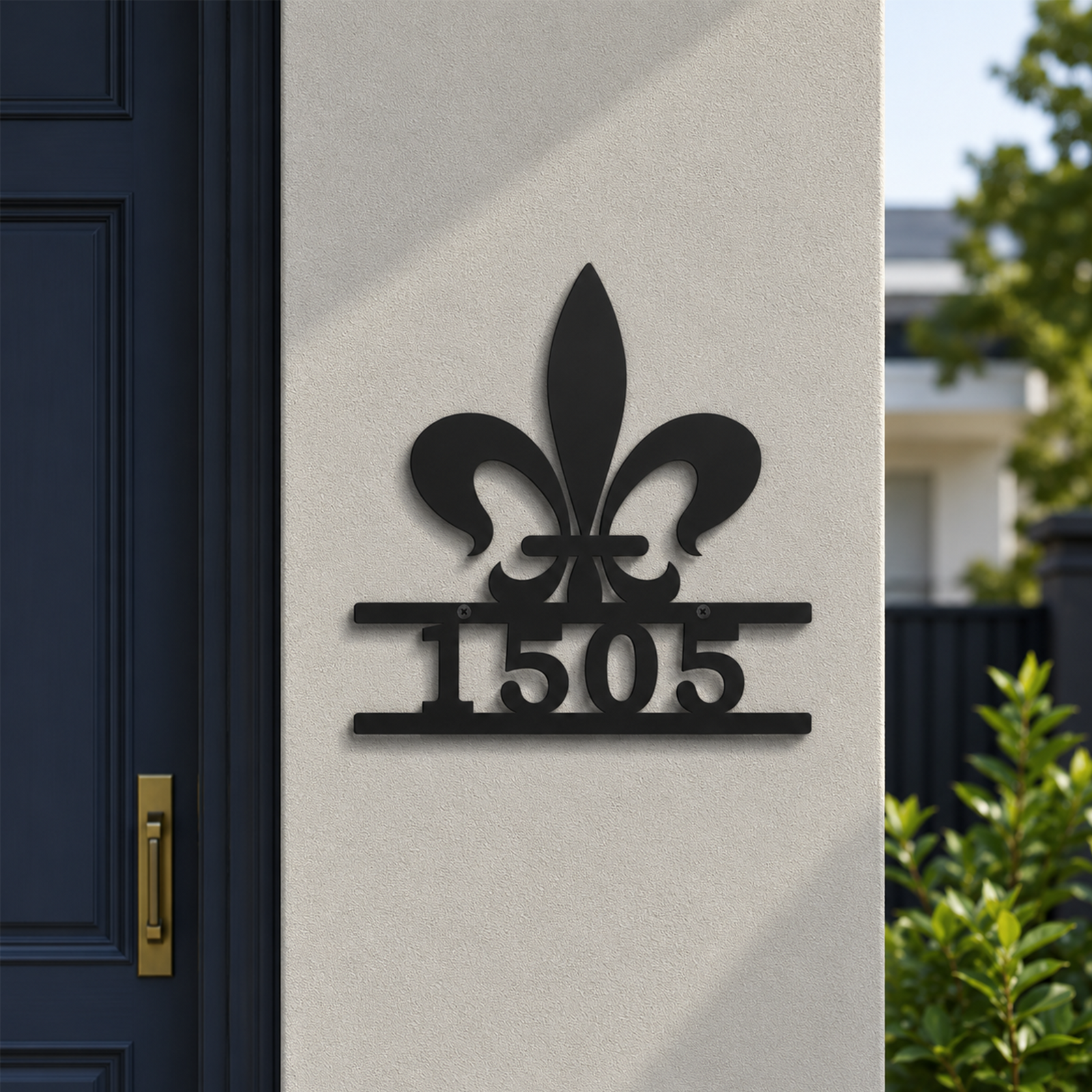 Black fleur de lis personalized metal address sign mounted on exterior home wall displaying house number 1505