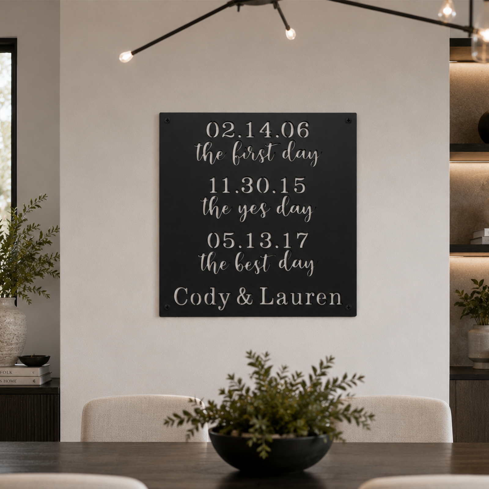 Custom couples timeline metal sign — personalized first date engagement wedding sign highlighting special relationship milestones above a dining room table.