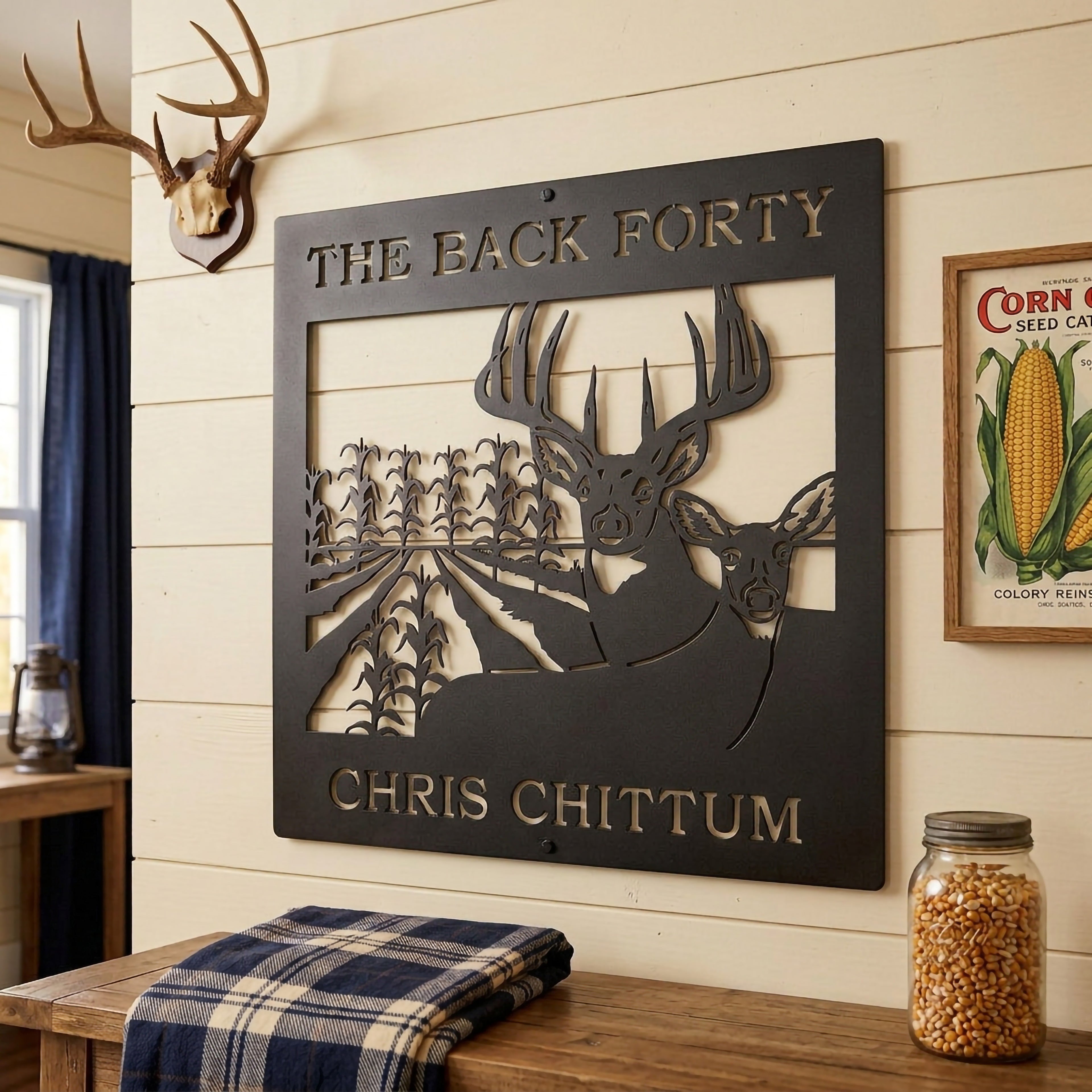 Satin black custom deer farm metal sign with buck doe and cornfield design displayed on rustic farmhouse wall