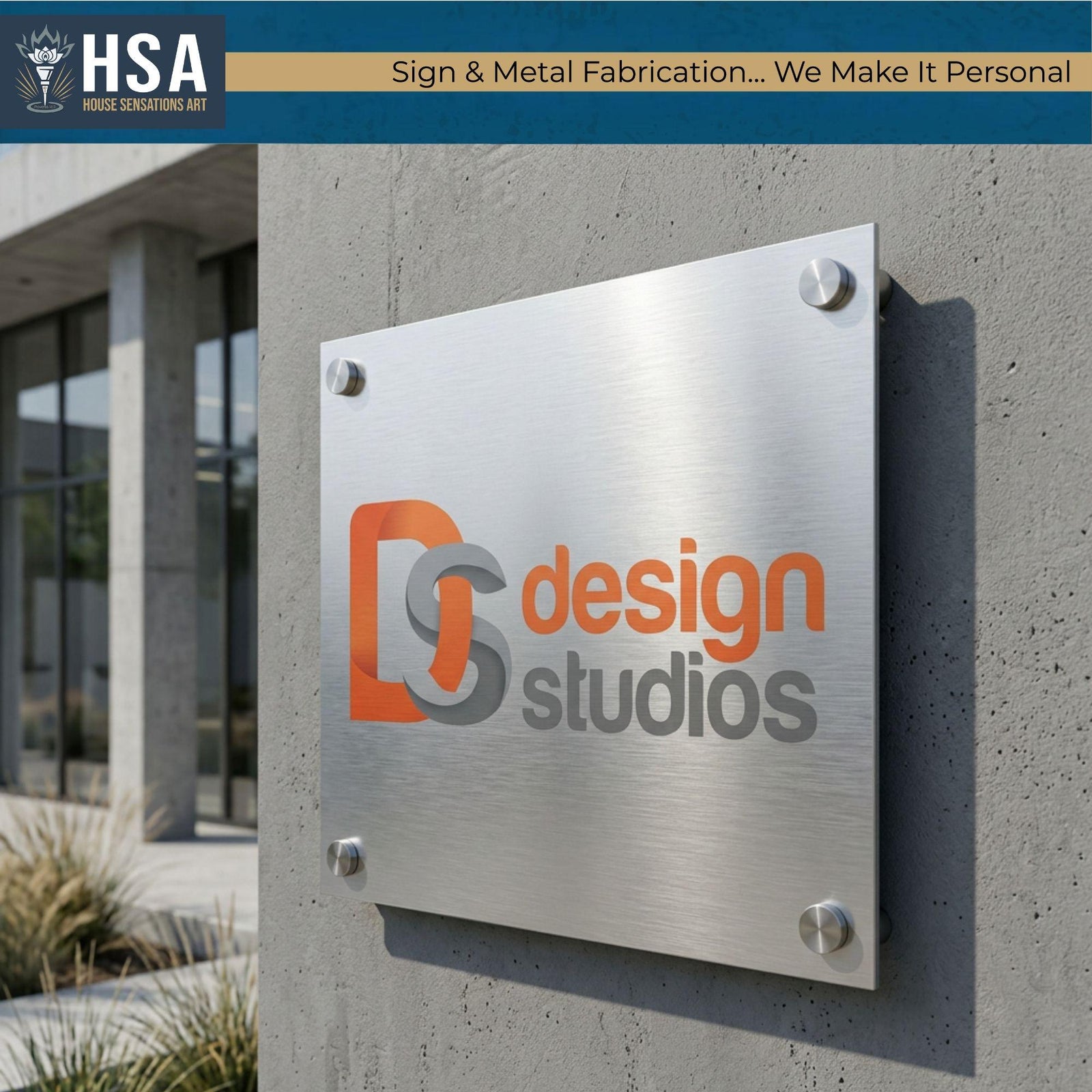 Modern brushed aluminum office sign with custom design studios logo mounted on concrete exterior wall using standoff mounts