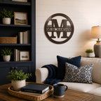 Espresso custom family monogram metal wall art displayed in a cozy living room with farmhouse decor