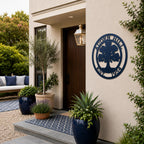 Navy blue oak tree family name metal sign displayed beside modern front door