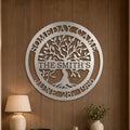 Custom family tree metal sign — personalized satin titanium family name wall art displayed on an elegant interior wall with inspirational home décor accents.