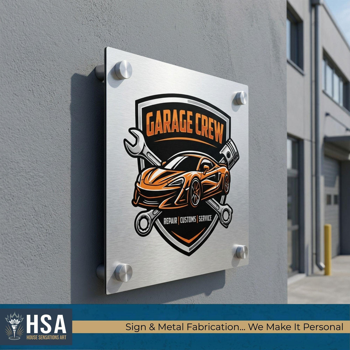 Brushed aluminum garage crew business sign mounted on exterior wall with automotive logo and standoff hardware