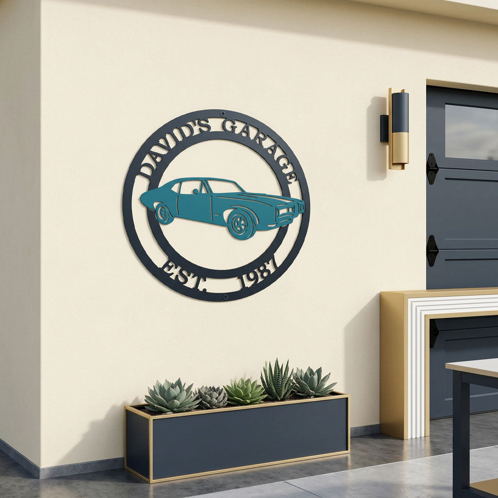 Personalized garage metal wall sign featuring classic muscle car design with custom garage name and established date mounted on modern outdoor garage wall