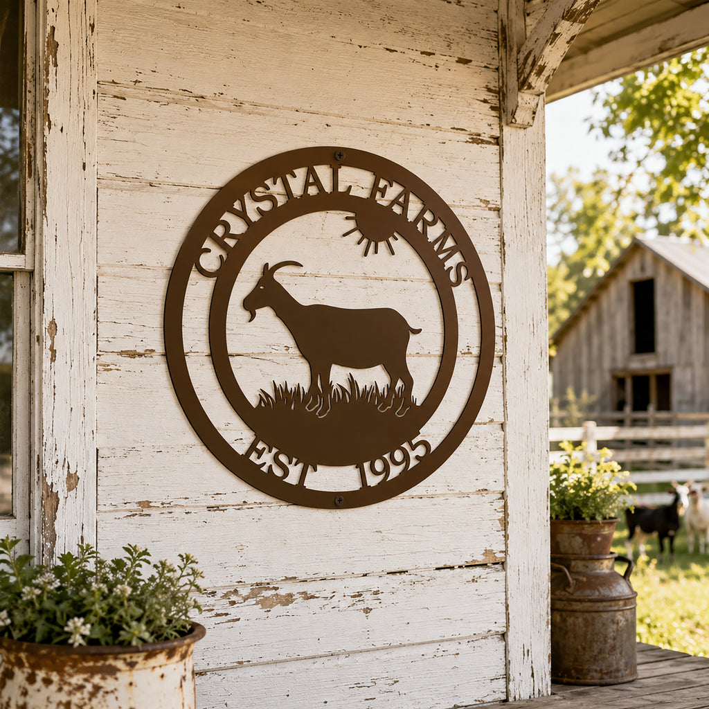 Custom goat farm metal sign in espresso finish displayed on a weathered farmhouse wall with a rural farm setting and personalized farm name.