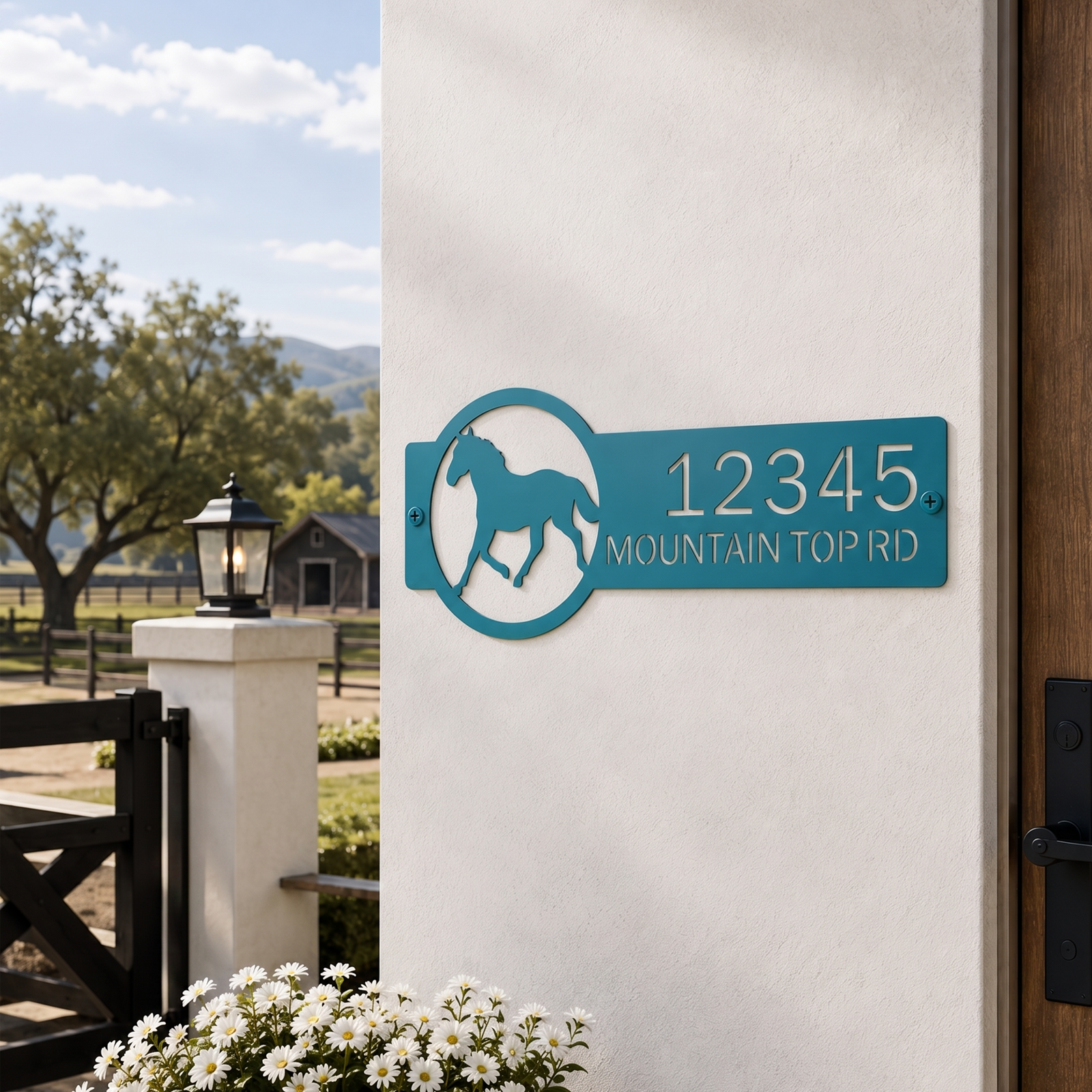 Turquoise horse ranch address metal sign displayed beside farmhouse entry