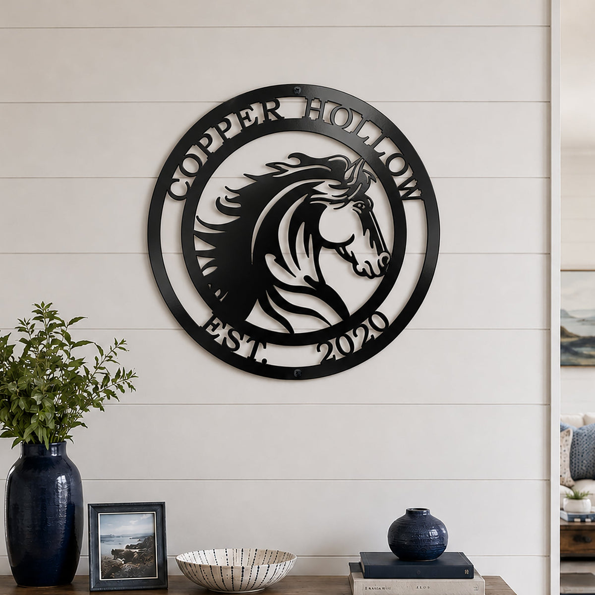 Black custom horse metal sign displayed above wooden console table in farmhouse home