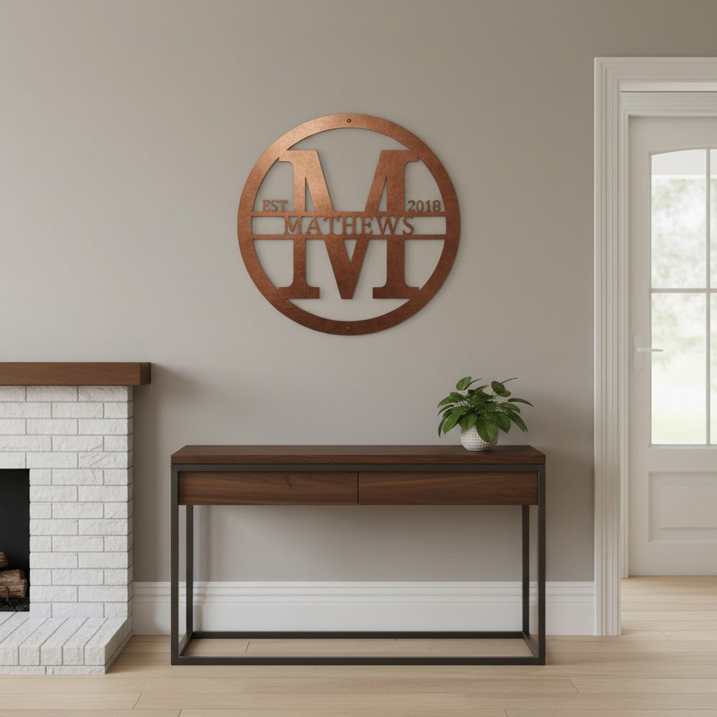 Custom Tuscan Copper metal monogram sign featuring the letter M, family name Matthews, and established year displayed in a modern entryway.
