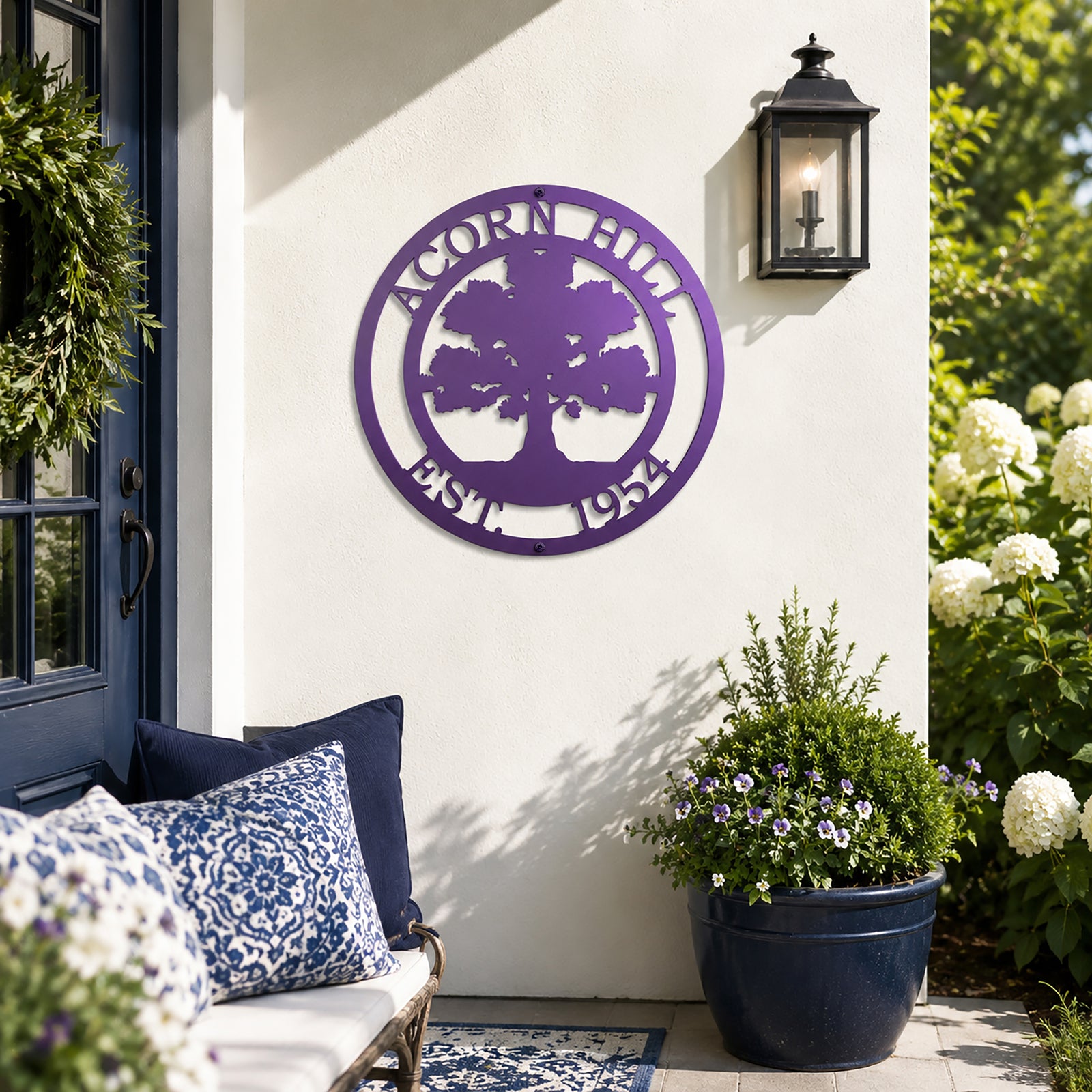 Lilac oak tree family name metal sign displayed near front porch garden