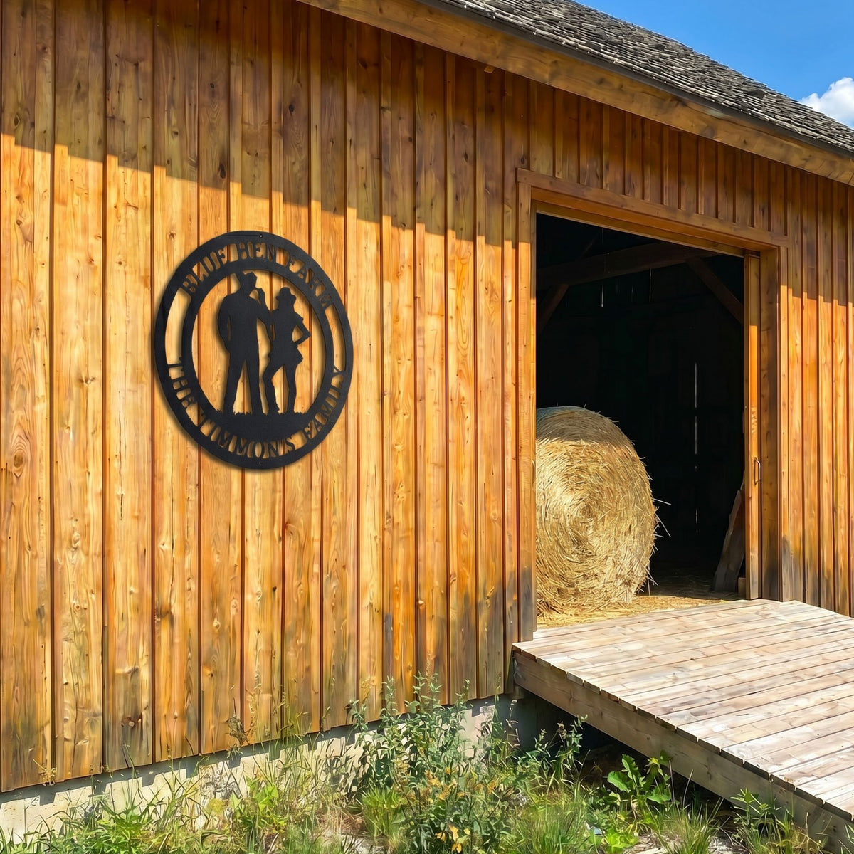 Personalized western cowboy couple metal sign displayed on rustic wooden barn exterior with farmhouse décor