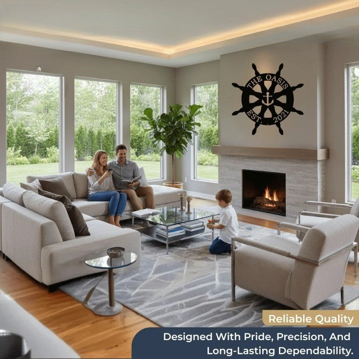 Black metal ship wheel anchor sign with custom text above a fireplace in a modern living room with a family.