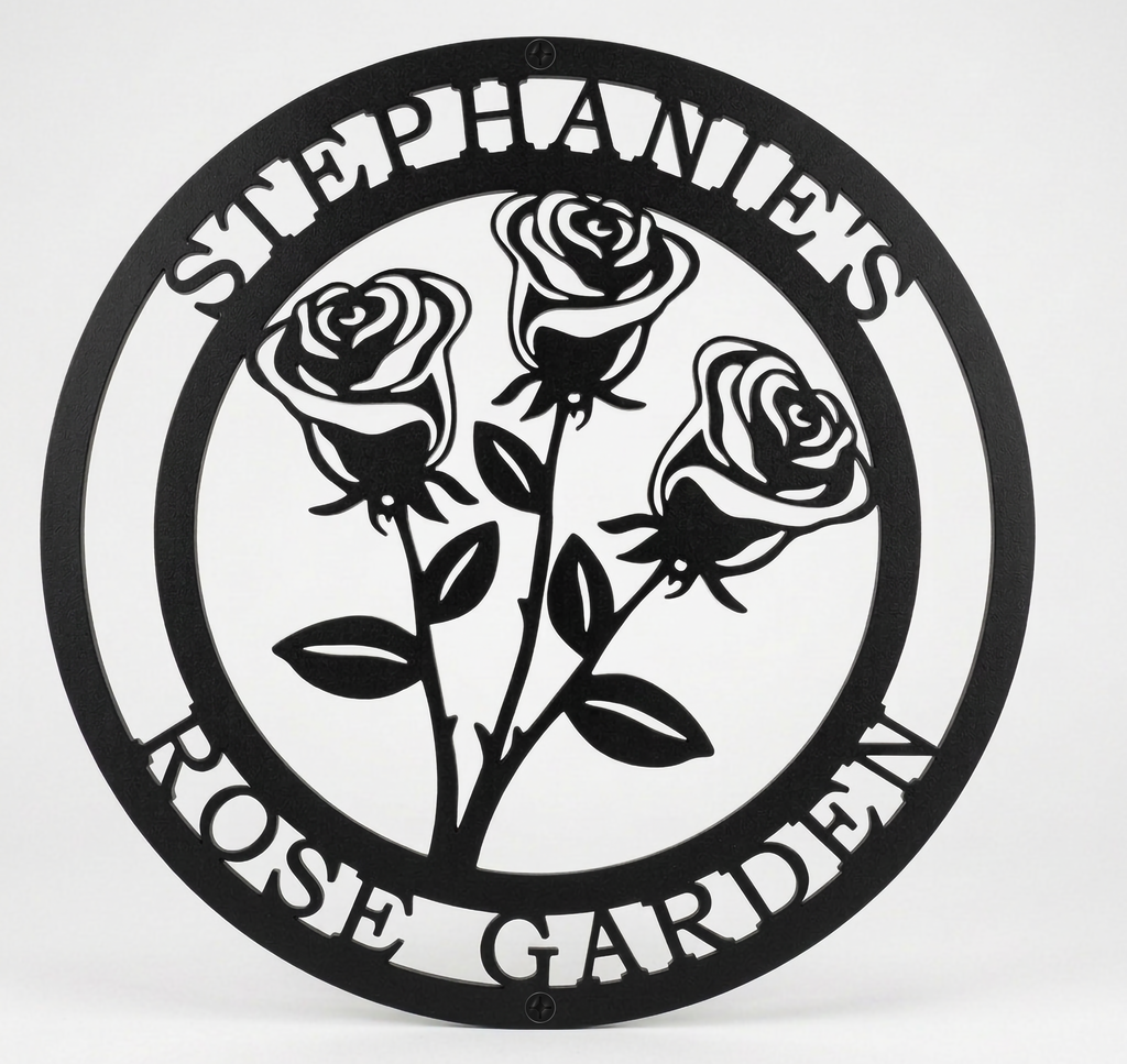 Flat view of a black circular personalized metal sign featuring a stylized three-rose bouquet cutout with the name layout over a pure white background.