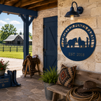 Ocean blue Twisted Pines Farm metal sign with horse and raven design displayed on rustic ranch porch wall