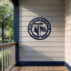 Navy blue custom lineman metal sign displayed on outdoor porch wall