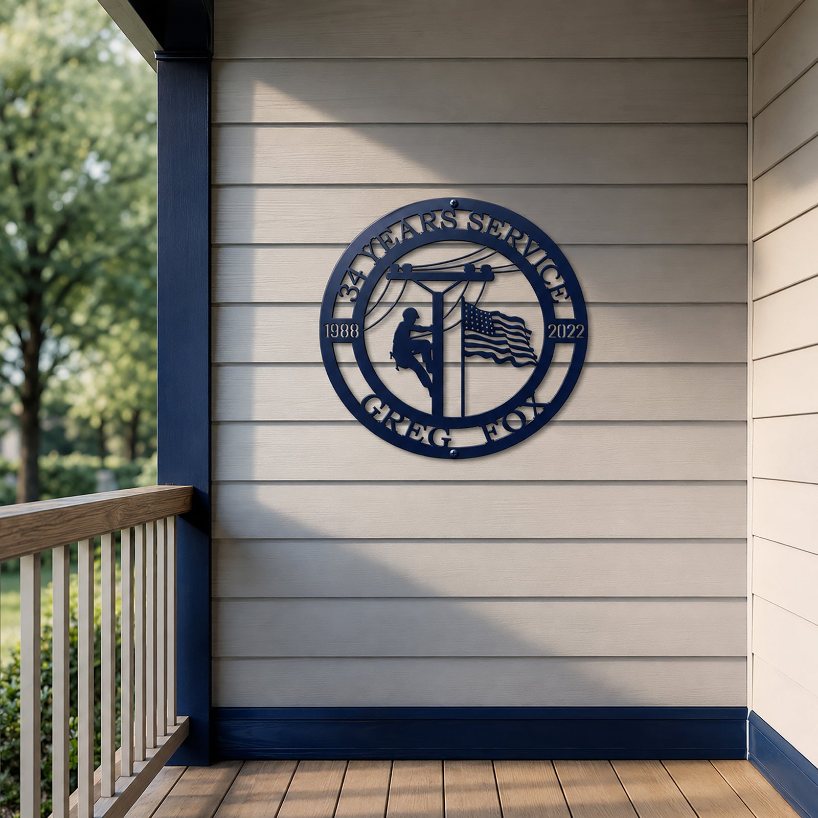 Navy blue custom lineman metal sign displayed on outdoor porch wall
