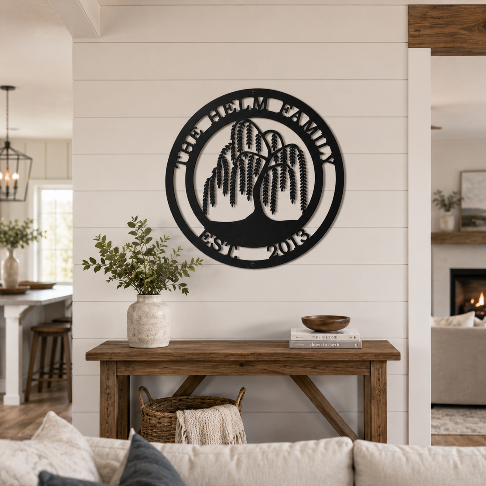 Custom weeping willow tree metal sign — personalized family heritage wall decor displayed on a white shiplap accent wall in a farmhouse living room.