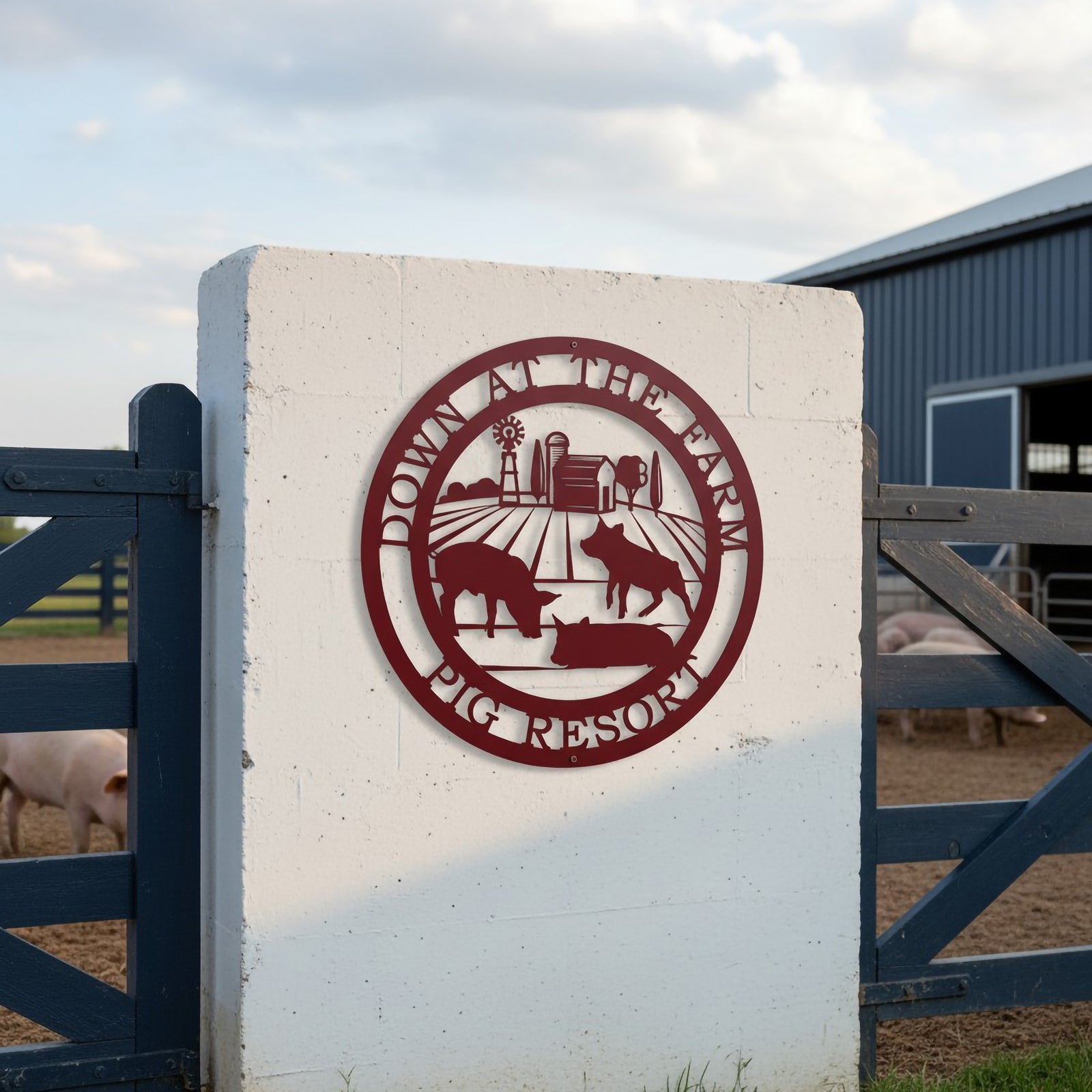 Deep red pig resort metal sign with barn and pig silhouettes mounted on a white farm gate post