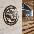 Espresso pig resort metal sign with farm and pig design mounted on a light wood barn wall near pig stalls