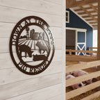 Espresso pig resort metal sign with farm and pig design mounted on a light wood barn wall near pig stalls