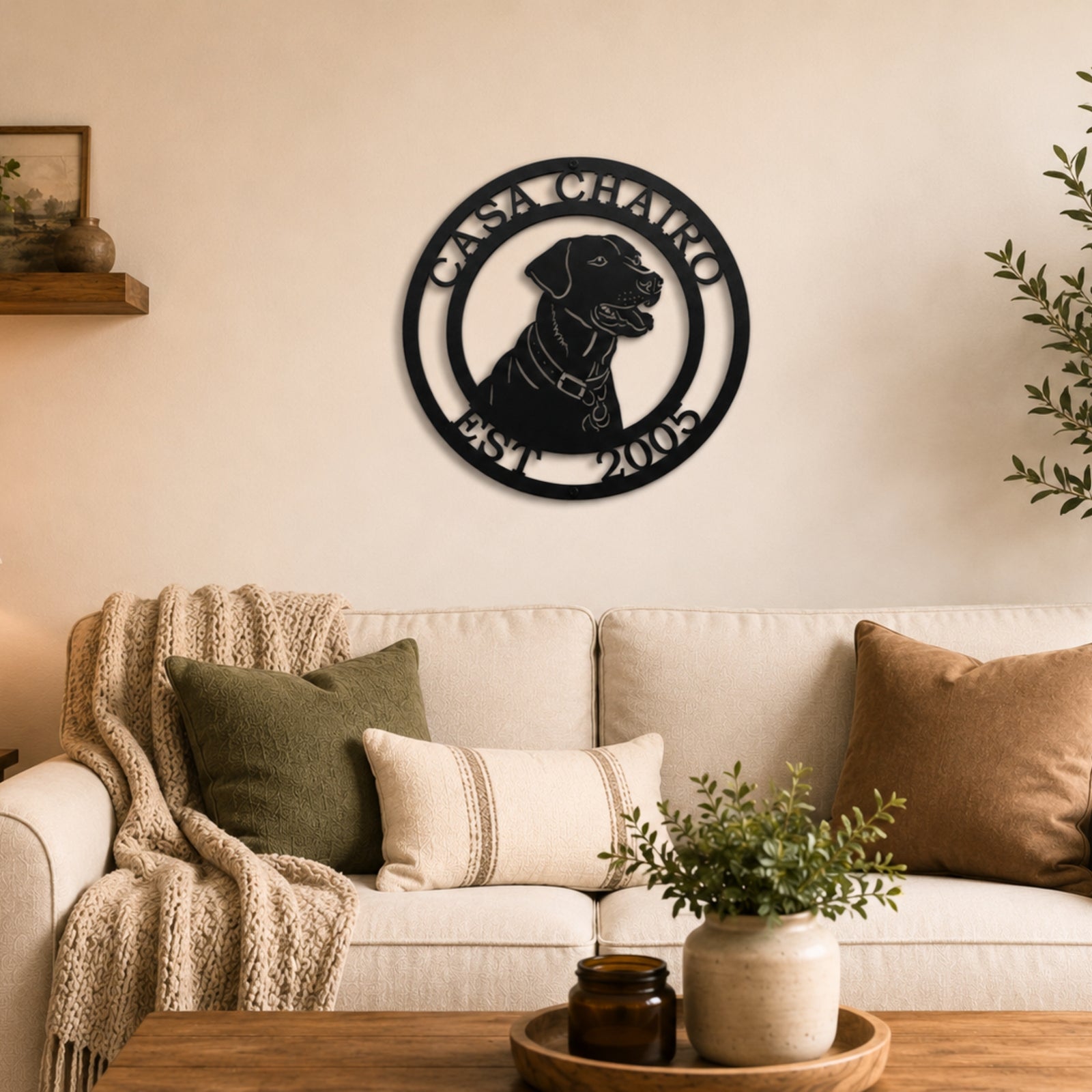 Custom Labrador Retriever metal wall art with personalized name and established year above neutral living room sofa